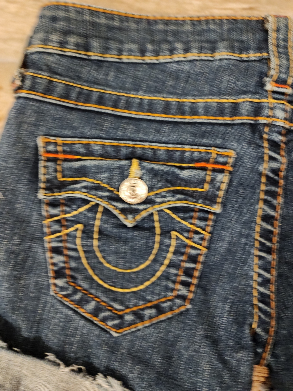 True Religion Mid Wash Rolled Cuff Distressed Denim Shorts - Picture 4 of 6